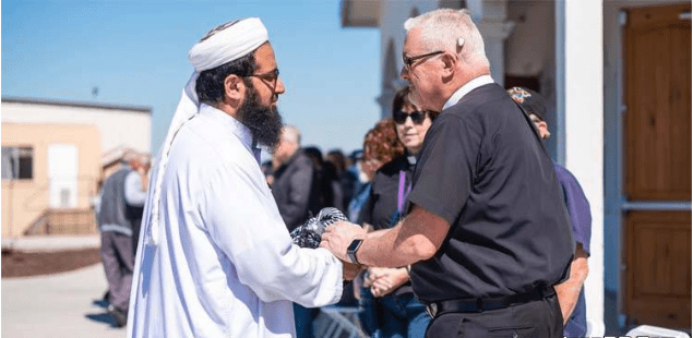 Non-Muslims guard mosques during prayers in the United States